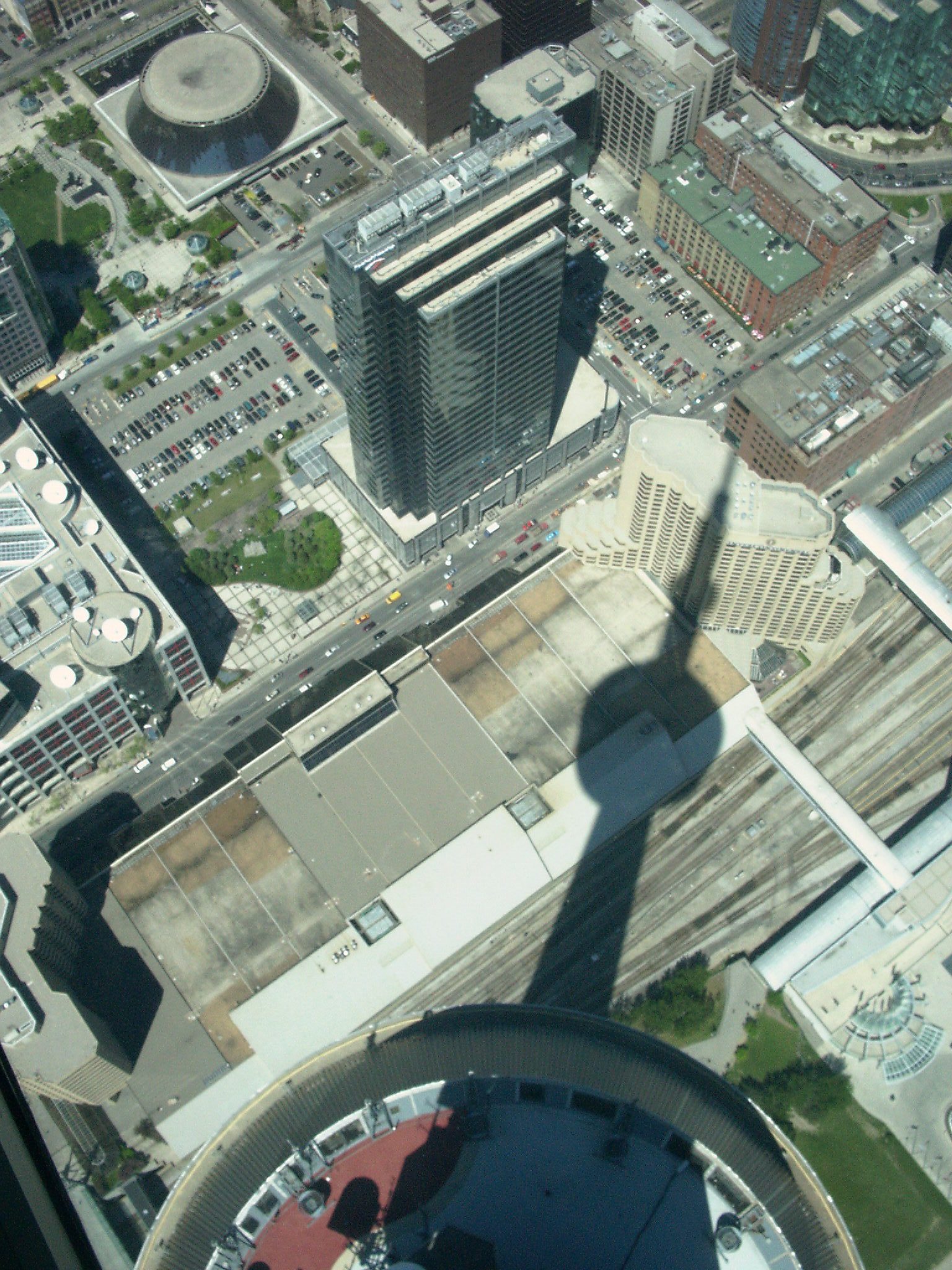 From the upper deck: the roof of the Rogers Centre and the shape of the railway lands laid out to the east.